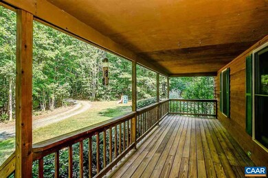 Extra wide country front porch.