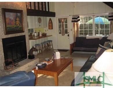 Den/Family/Great Room. Really Cool Tabby fireplace