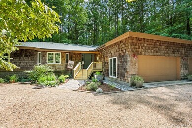 Ranch-style house featuring a garage