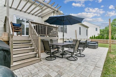 View of patio featuring a pergola, a deck, and an