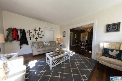 Beautiful hardwood floors and the living room flow