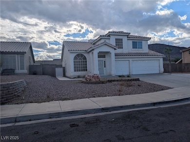 Mediterranean / spanish-style home featuring driveway, a garage, stucco siding, and a tiled roof