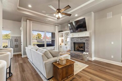 Living room featuring a wealth of natural light, a