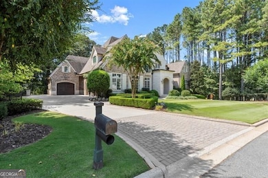 Meticulous professionally designed landscaping creates the perfect scene to welcome you home.