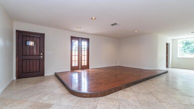 elevated wooden floor sitting area