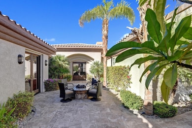006ENTRY COURTYARD WITH LUSH PLUMERIA
