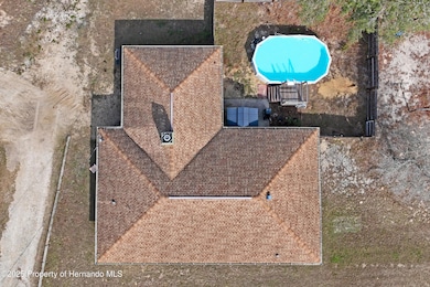 12404 Dolquieb Ln, Weeki Wachee, FL 34614 - photo 6