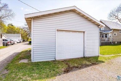 Detached garage with driveway