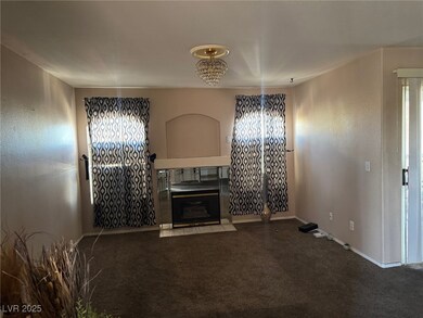 Unfurnished living room with carpet floors and a h