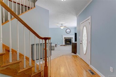 Such a bright and inviting entrance!  Crown mouldi