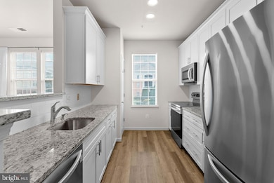 42470 Pennyroyal Square unit 204, Ashburn, VA 20148 - photo 2