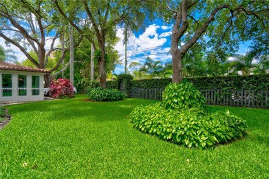 Enchanting gardens beautifully landscaped throughout providing indoor/outdoor living with views from all living areas. Paved driveway for parking inside