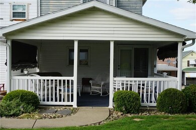 The rear covered patio is located off the kitchen 