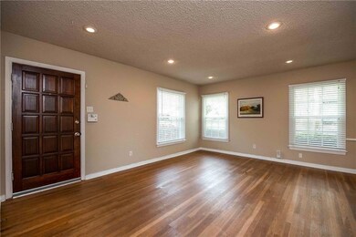 Original hardwood flooring, nice sized living room