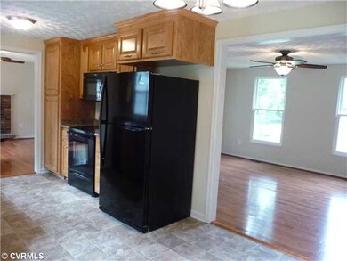 Kitchen - Kitchen is Open to the Formal Living Roo