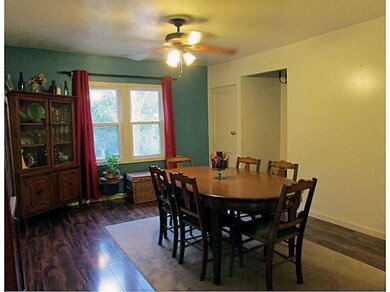 Dining Room. The dining room is open to the living