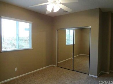 Mirrored closets in secondary bedroom.