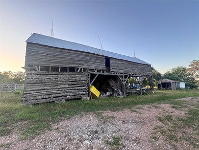 Outdoor structure at dusk featuring an outbuildin
