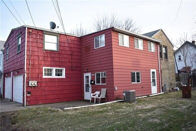 Brown Brick building is the lower entry level unit
