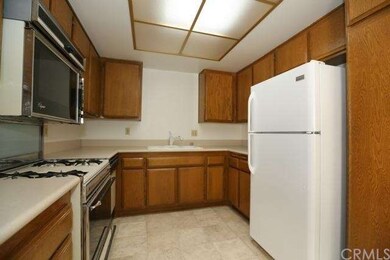 Kitchen has a gas stove and new flooring.  the ref