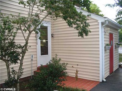 Exterior Back - Side entrance from driveway into f