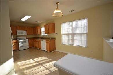 Sunny breakfast nook overlooks private back yard