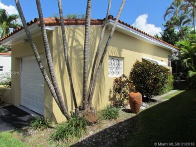 Extended 1 car garage with convenience of a side door.