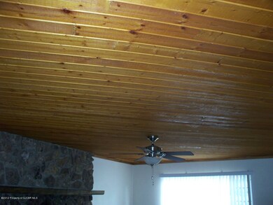 Living Room with Wood Ceiling