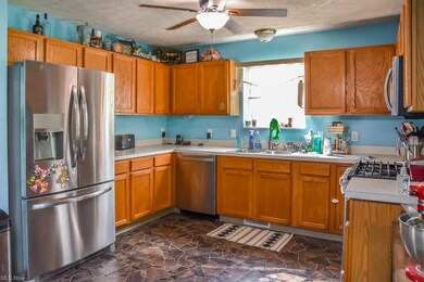 Spacious eat-in kitchen with stainless steel appli
