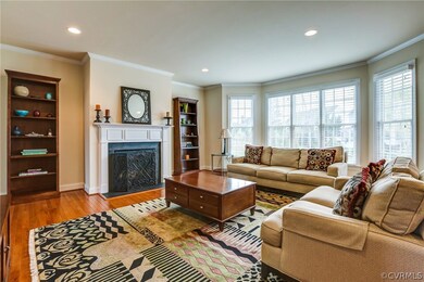 Bright, open family room with gas fireplace.