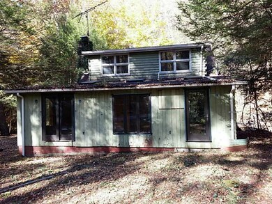 Exterior Front. Front View from Nature Run Rd.