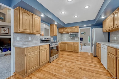 Kitchen with real hardwood floors.