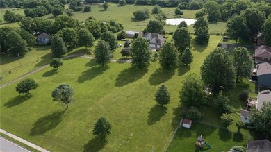 703 N Madison St, Raymore, MO 64083 - photo 7