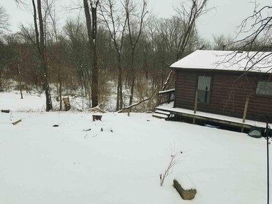 Rear of home and parking area.