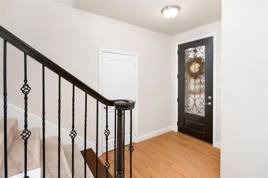 Upon entering the home you are greeted with wood f