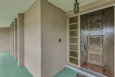 Unique detailed solid wood door.