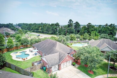 31302 Wolf Rose Ln, Spring, TX 77386 - photo 6