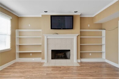 Fireplace and bookshelves in the great room.