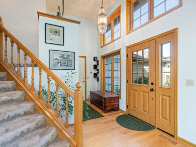 Front entrance & foyer.  Notice garage entry #1. G