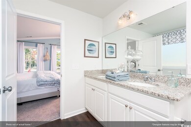 Bathroom with vanity and wood-type flooring