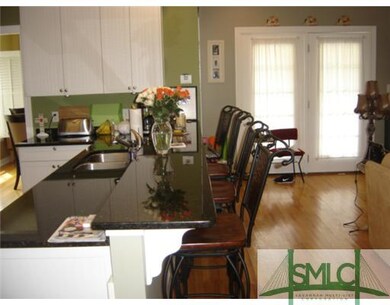 Kitchen. Breakfast bar comfortably seats 4 people.