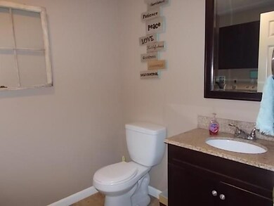 DOWNSTAIRS BATHROOM WITH WASHER AND...