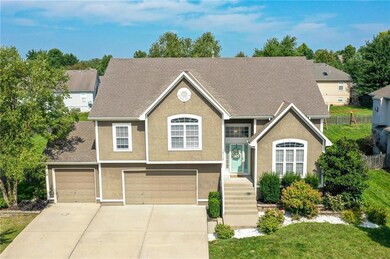 1518 Saddlebrook Rd, Raymore, MO 64083 - photo 2