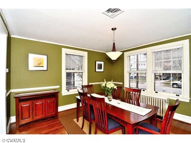 Dining Room - Large dining room with historic moldlings & lots of light