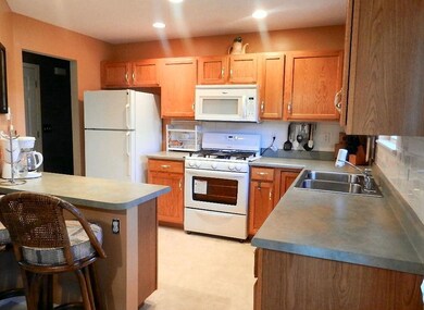 Kitchen with all white appliances