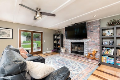 Great Room with cozy woodburning fireplace