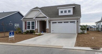 Craftsman house featuring a garage