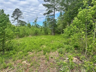 View of landscape with a wooded view
