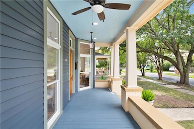 Porch featuring ceiling fan