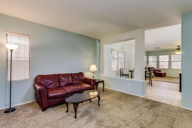 Living Room Opens to Dining